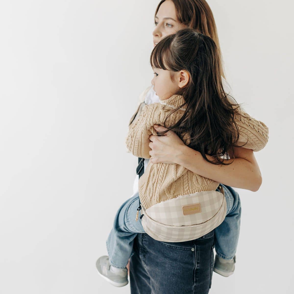 Tushbaby Liftoff Toddler Sling | Gingham